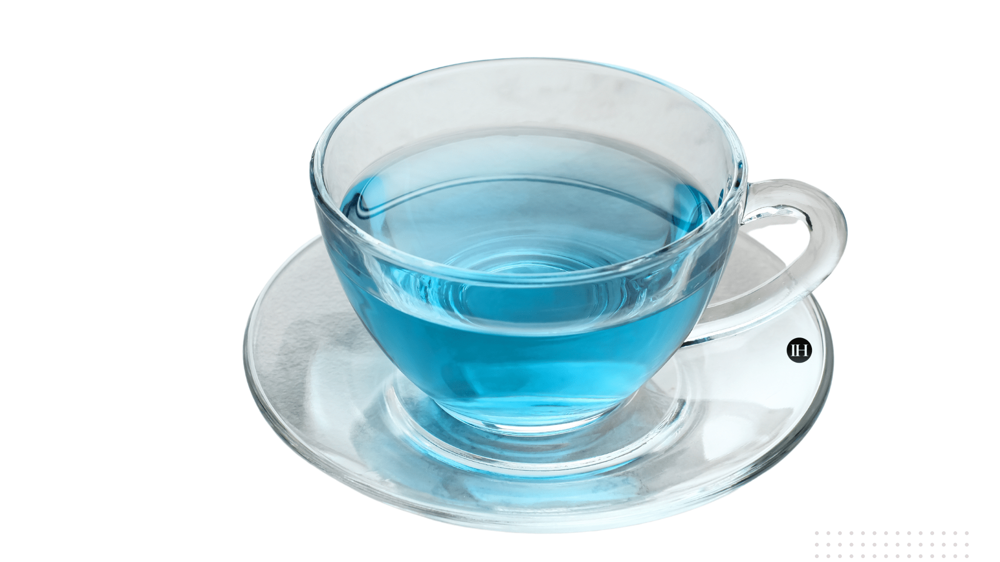 An illustrative example of a clear glass cup and saucer with blue herbal tea