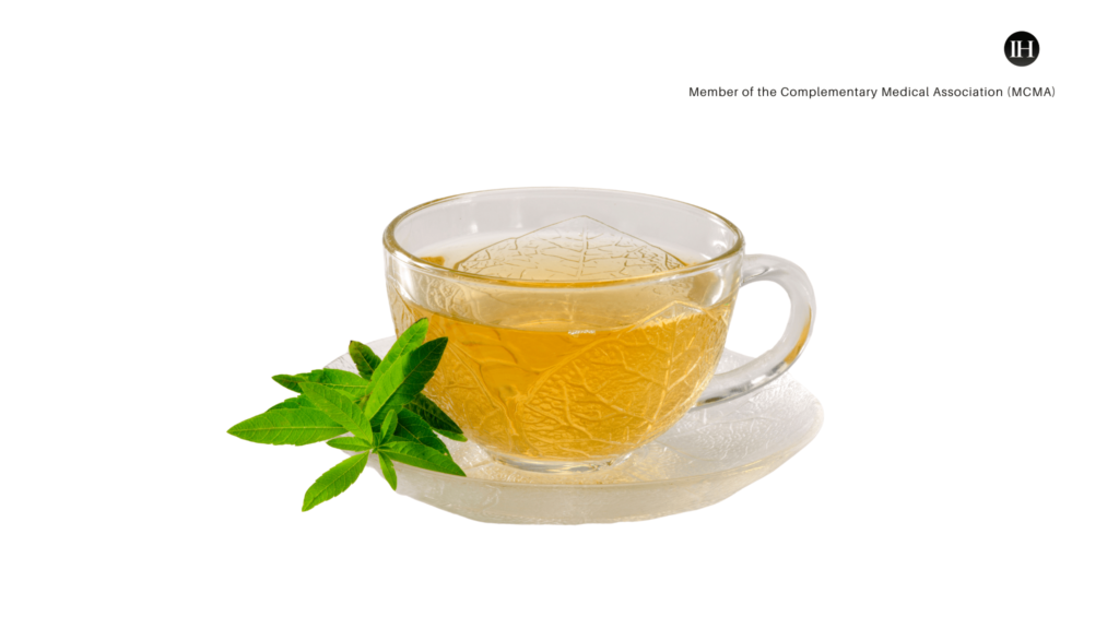 An illustrative image of clear cup and saucer made of glass with lemon verbena tea